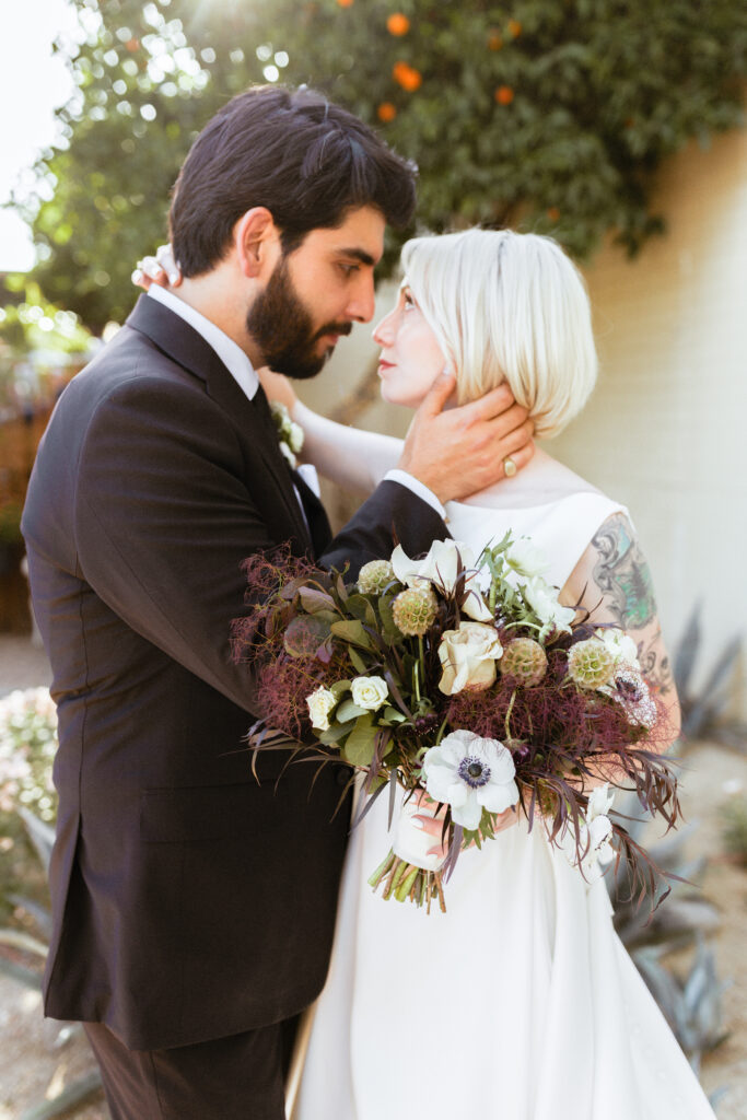 A couple shares a quiet moment during golden hour — perfectly timed in their wedding photo timeline for the most romantic light. Dani Lacey Photographs.