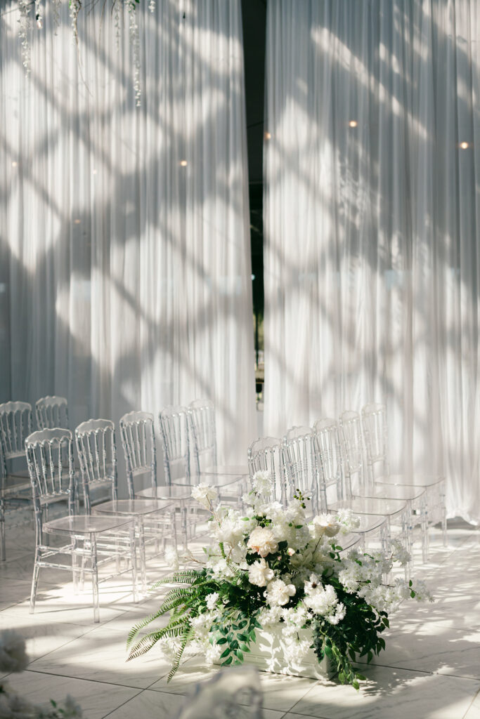Sheer ceremony draping with sunlight