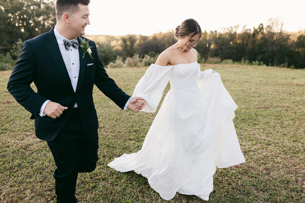 Couple walking together in field