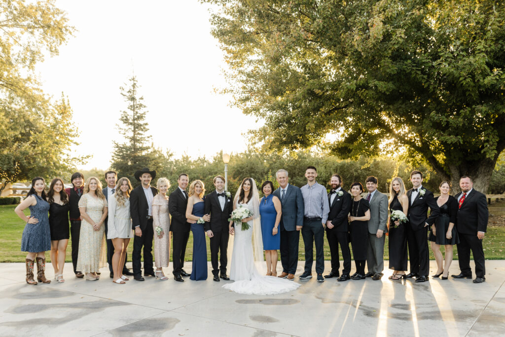 Wedding party gathered together for a group portrait