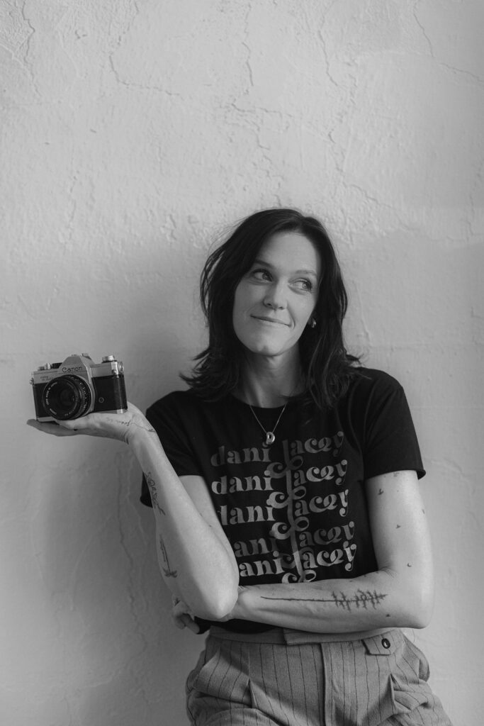 Wedding photographer holding vintage camera 6 wedding red flags