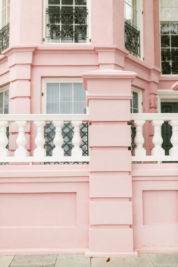 Soft pink historic building with classic architecture photographed for a wedding in South Carolina.