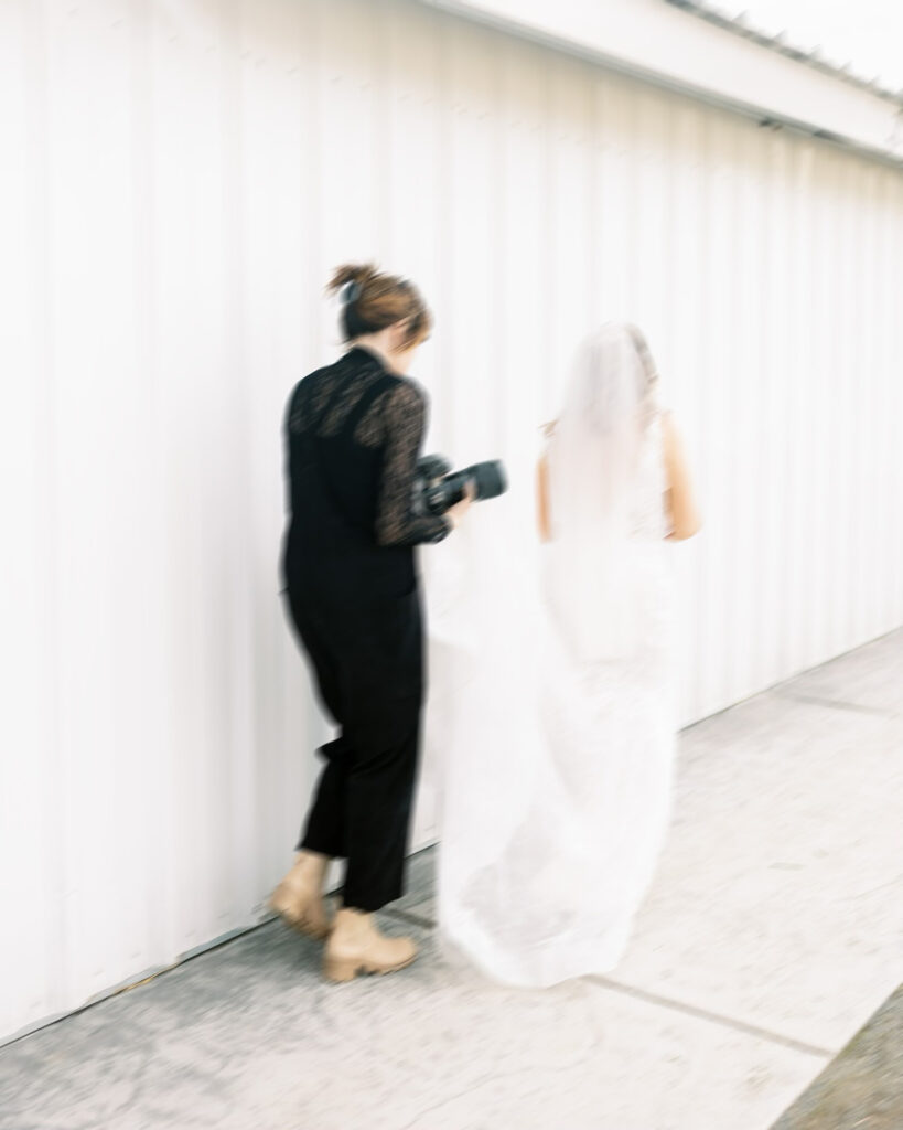 photographer walking quietly with bride working weddings as an introvert