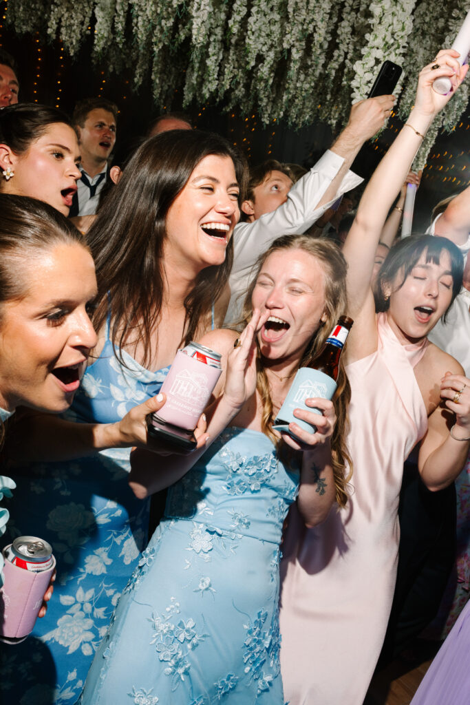 Wedding guests dancing and celebrating together during a lively reception in South Carolina.