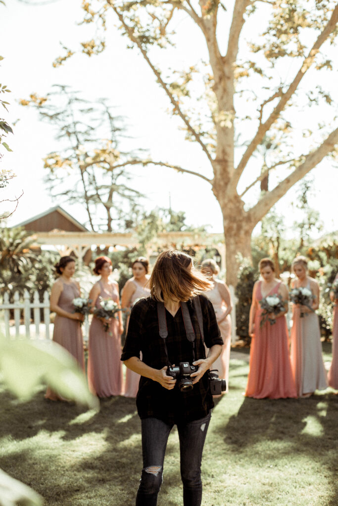 Wedding photographer documenting ceremony moments