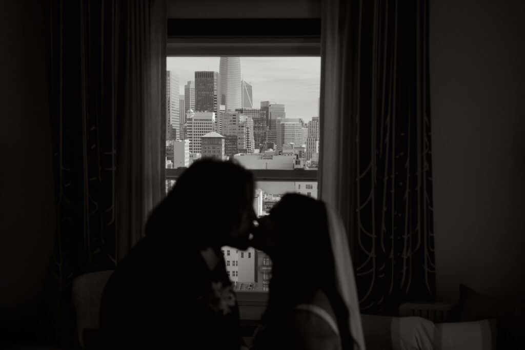 Couple silhouette with San Francisco skyline on Modern elopement day