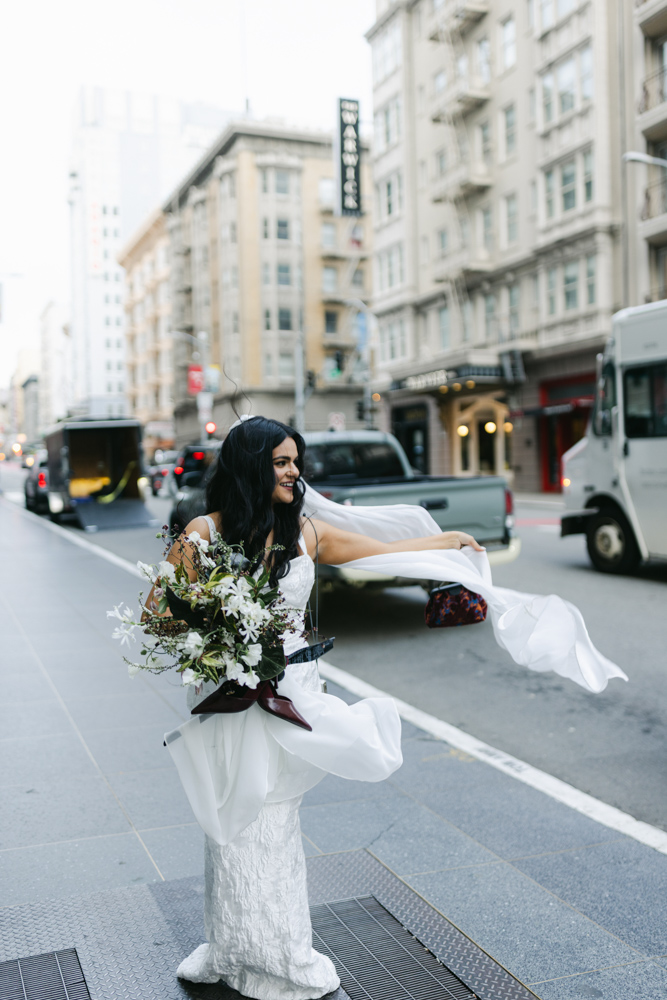 bride downtown veil in the wing