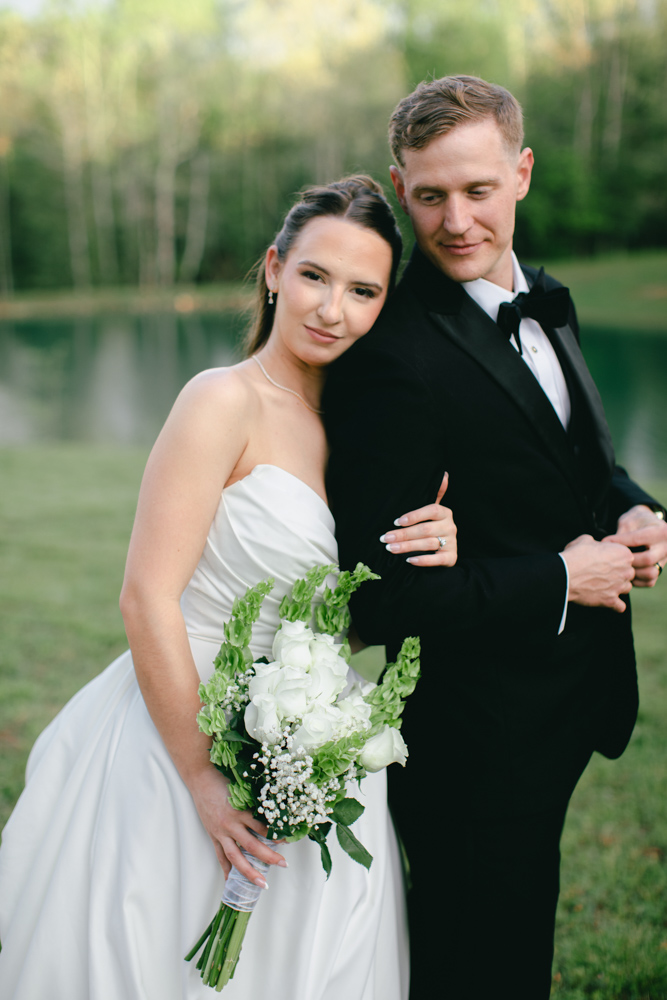 Editorial bride and groom portrait outdoors