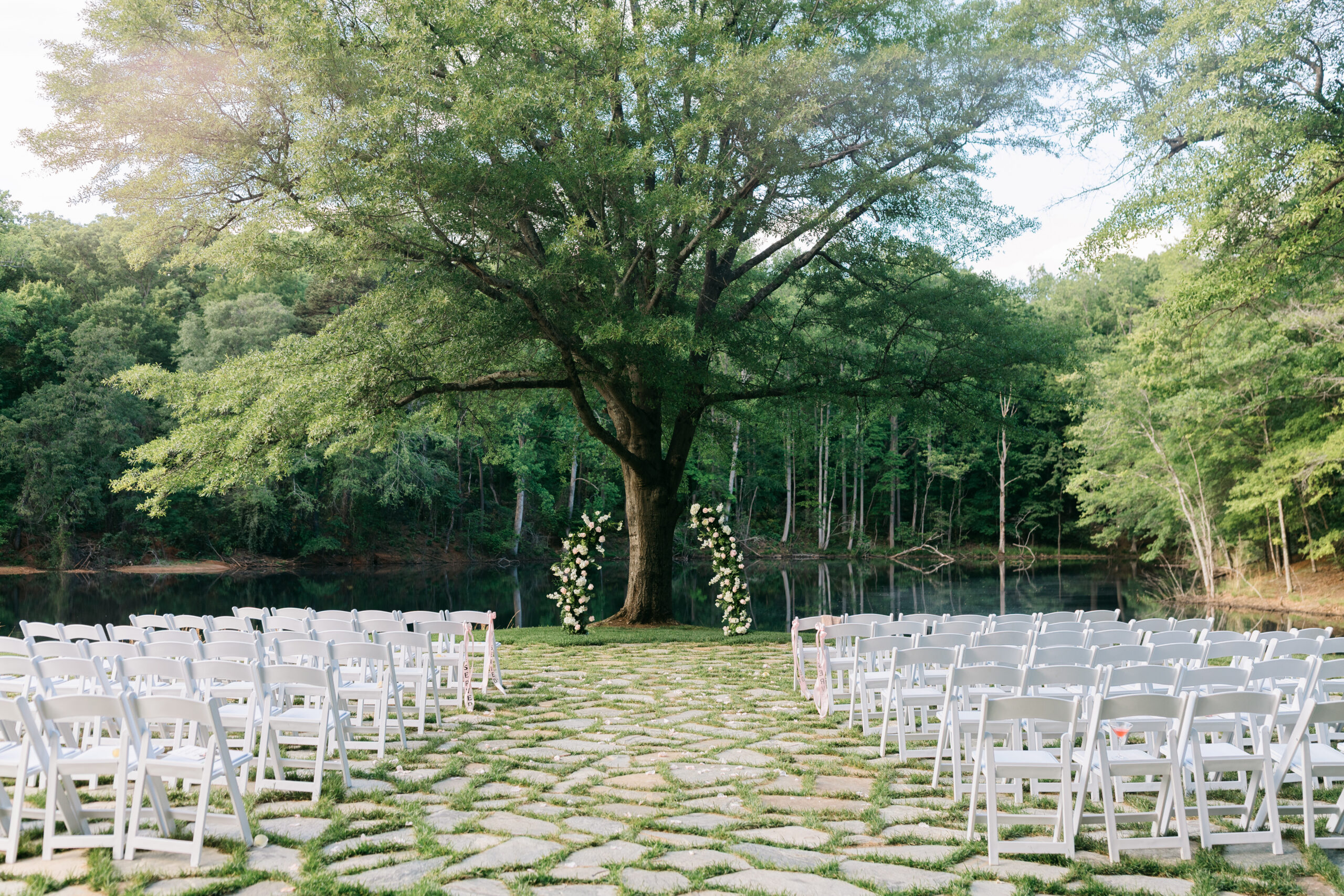 Outdoor lakeside wedding ceremony