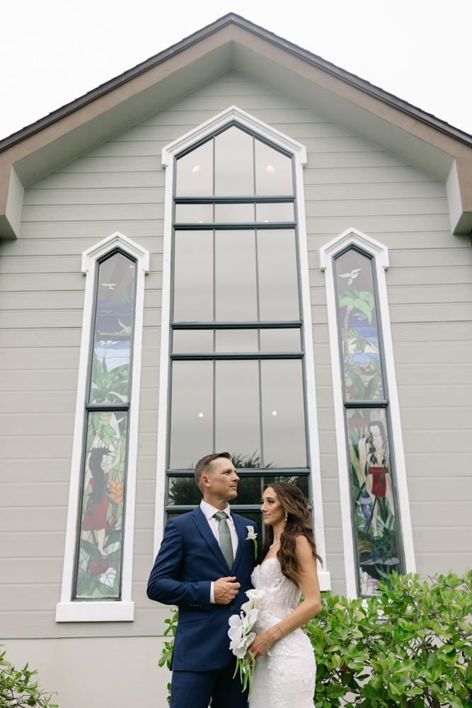 Bride and groom portrait outside chapel
