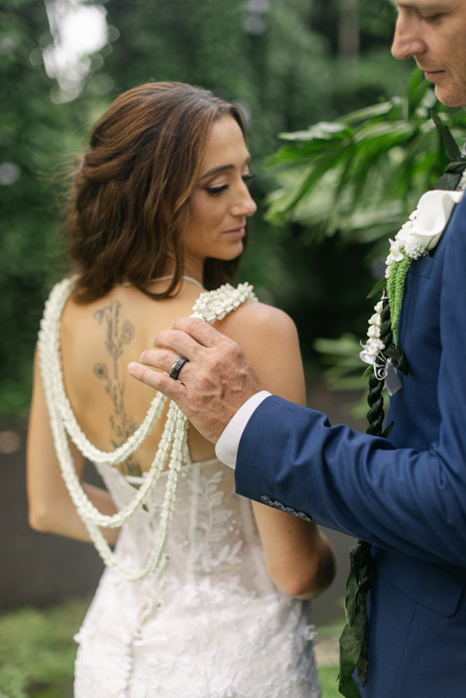 Bride showing floral back necklace detail
