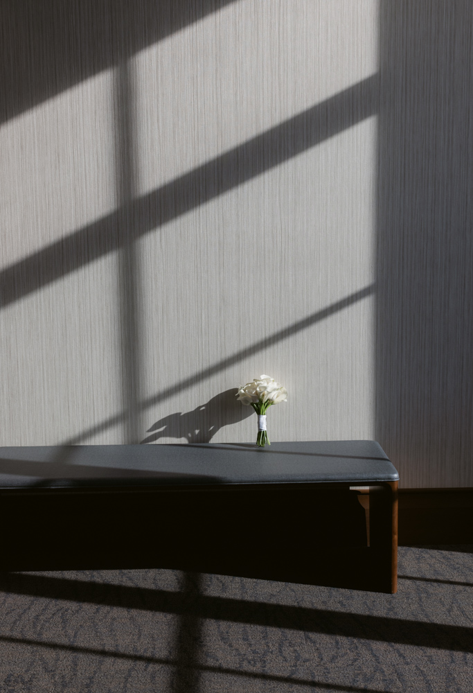White bridal bouquet at Spartanburg County Courthouse