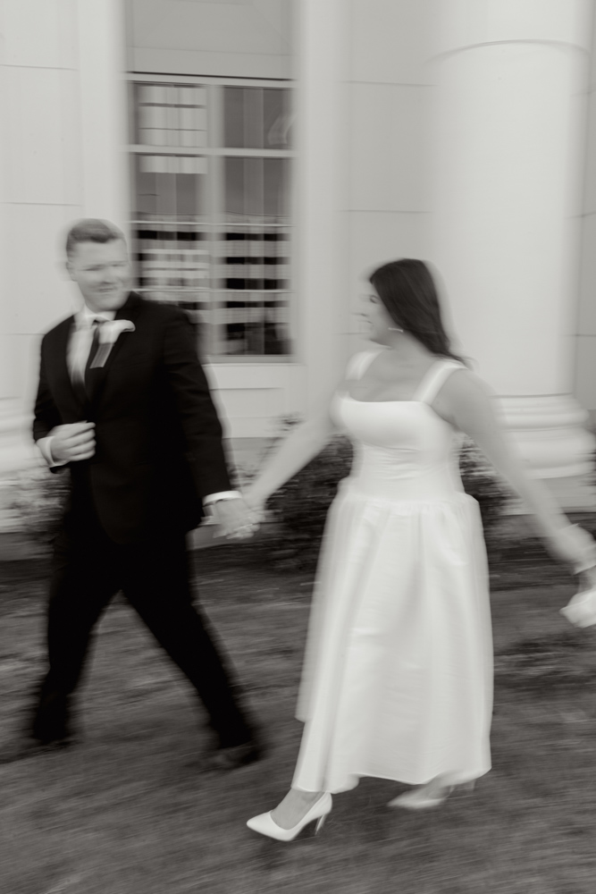Black and white motion portrait outside the courthouse