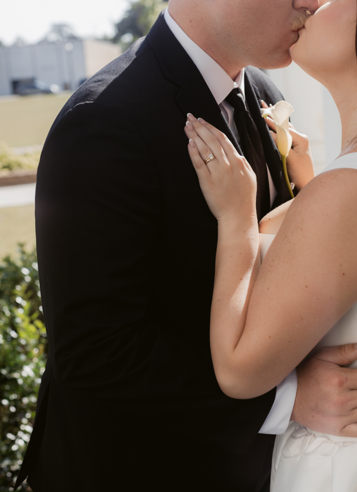 Close-up of wedding ring during courthouse wedding