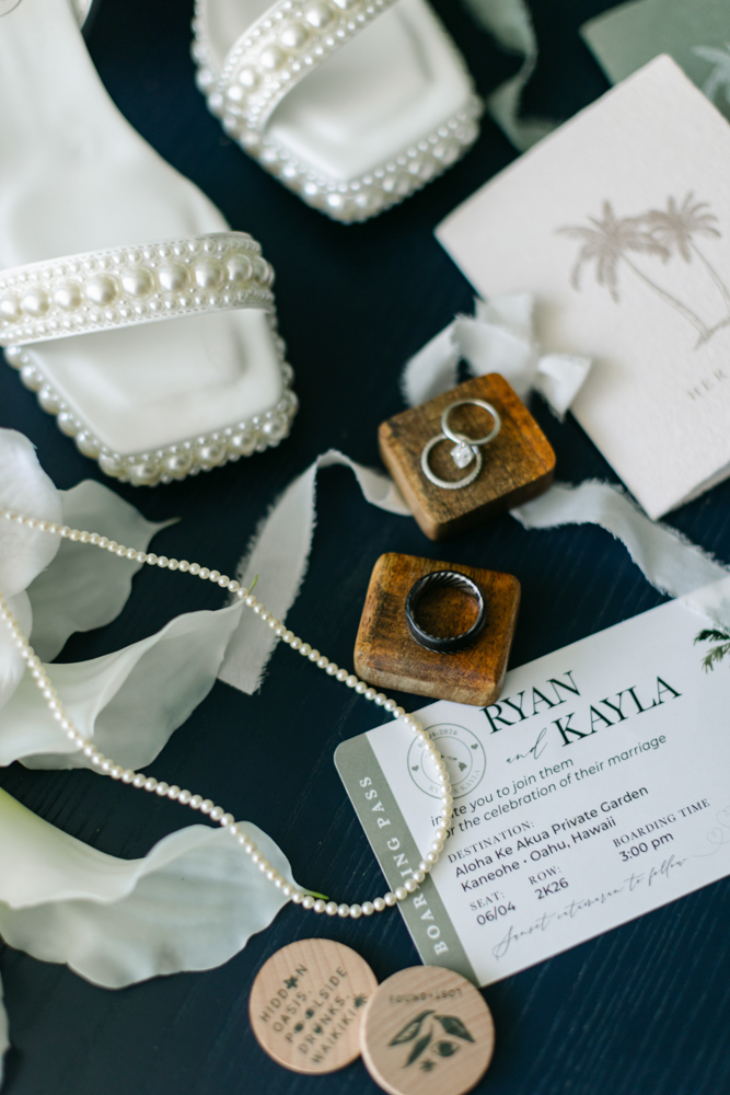 Hawaii wedding invitation with rings and bridal accessories