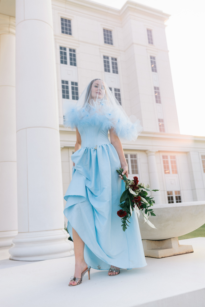 Bride in blue gown outside Spartanburg Courthouse